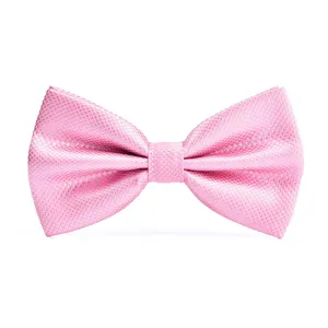 Close-up of a stylish pink bow tie with fine diamond texture, perfect for wedding grooms.