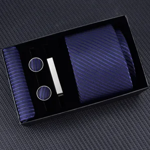 Men's navy blue striped necktie set with pocket square, cufflinks and tie clip in gift box.