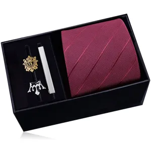 Men's business gift set including burgundy striped tie, tie clip and fashion accessories.