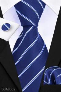 Men's business tie set detail featuring a blue striped tie, matching pocket square and cufflink.
