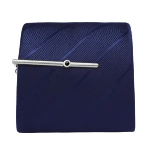Detailed shot of a classic dark blue striped tie paired with a sleek silver metal tie clip.