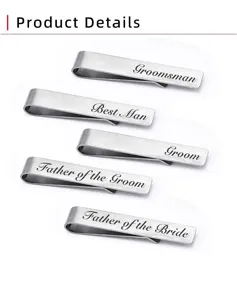 Detailed view of brushed stainless steel wedding tie clips with custom engraved text.