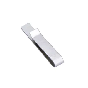Detailed view of brushed stainless steel tie clip, sleek metal texture for men's suit wear.