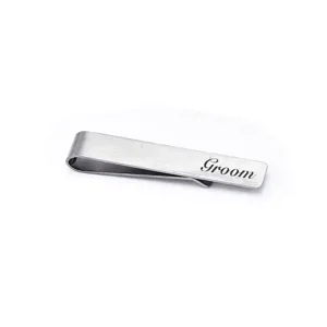 Stainless steel tie clip detail, brushed metal texture, wedding groom accessory laser engraved text.