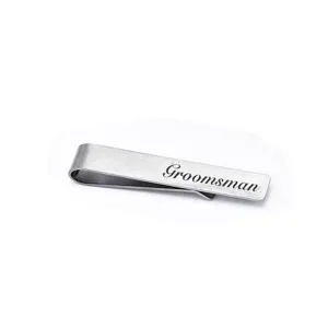 Stainless steel groomsman tie clip detail, brushed metal finish with custom laser engraving.