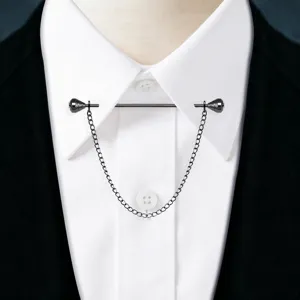 Detailed close-up view of a stylish mens metal shirt collar pin with chain tassel for formal suit.