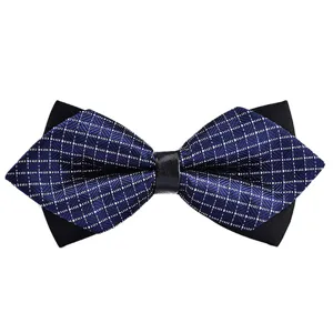 Detailed close-up of a stylish double-layer sharp point bow tie with navy blue pattern.