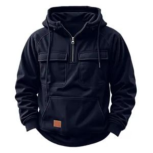 Detailed view of men corduroy half zip hoodie with chest pockets and adjustable hood design.
