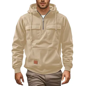 Men's casual corduroy quarter-zip hooded sweatshirt detail with functional front flap pockets.