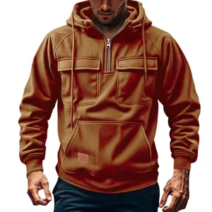 Close-up detail view of men half-zip corduroy hoodie with dual chest pockets and cozy hood.