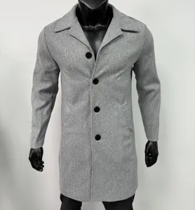 Men's grey single-breasted wool overcoat detailed view showing lapels and buttons.