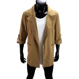 Close up detail view of casual khaki women blazer cardigan jacket open front professional wear
