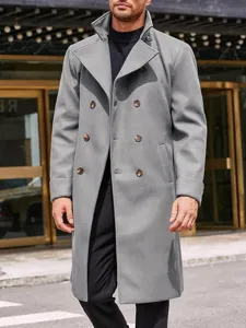Detail view of a stylish men's grey double-breasted wool trench coat in an urban setting.