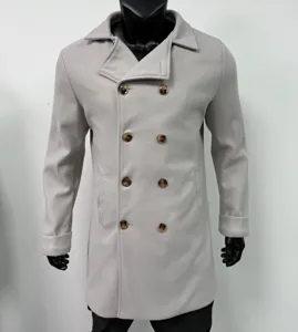 Detailed view of grey double-breasted woolen overcoat, thick winter trench jacket for men.