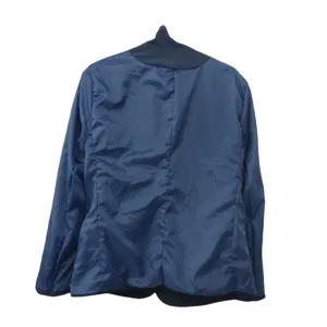 Close-up detail of the inner lining and neat stitching of the men's casual suit jacket.