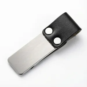Stainless steel metal clip with black leather holder detail view, ideal for notebooks.