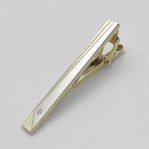 Men's formal metal tie clip with dual-tone finish and rhinestone detail, sleek business accessory.