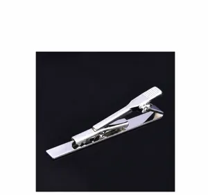 Exquisite silver metal tie clip detail view, elegant mens accessory for formal business wear.
