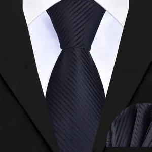 Detailed view of the black striped business tie and matching pocket square fabric texture.