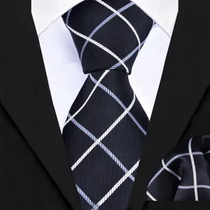 Men's business formal plaid tie and pocket square detail shot showing fine fabric texture.