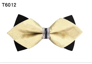 Close-up of the elegant black and gold sharp bow tie with sparkling crystal rhinestone center.
