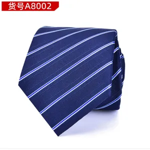 Close-up detail of a classic blue men's necktie featuring elegant white diagonal stripes.