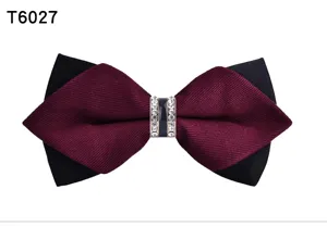 Close up view of burgundy black layered bow tie rhinestone metal buckle detail.