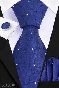 Detail shot of blue men's business tie set texture, matching pocket square and cufflinks.