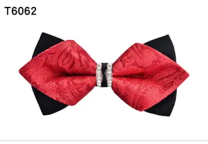 Detail view of the red black pointed bow tie featuring crystal rhinestone center ring and pattern.