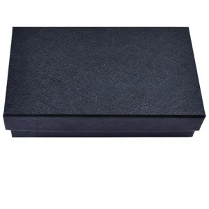 Black textured gift box packaging, premium presentation for men's accessories like tie clips.