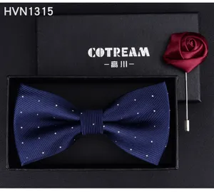 Men's navy blue polka dot bow tie and dark red rose brooch gift box set for formal wedding wear.