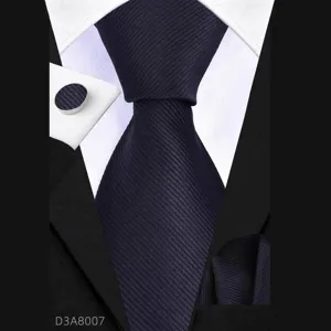 Men's business navy blue tie set with pocket square and matching fabric cufflinks.