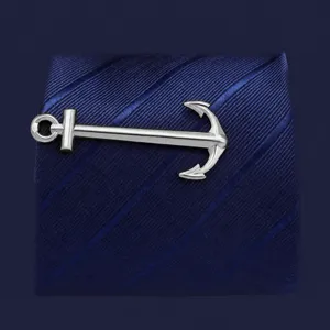 Anchor tie clip detail shot, silver metal nautical design, elegant accessory for men.