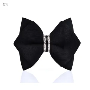 Black bow tie detail featuring a crystal embellished center ring for formal menswear.
