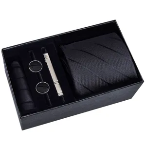Luxury men's black business tie gift set including pocket square cufflinks and tie clip.