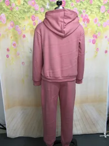 Back view of a casual pink solid color hooded sweatshirt and pants two-piece set, cozy loungewear.