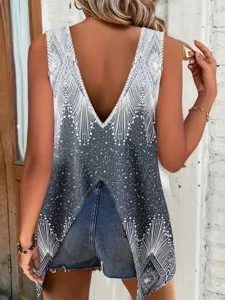 Detailed back view of women's sleeveless V-neck tank top with geometric print and split hem.