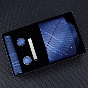 Detailed view of mens luxury blue plaid tie pocket square cufflink tie clip gift set.