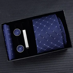 Men's elegant blue plaid necktie gift set with pocket square, cufflinks and silver tie clip.