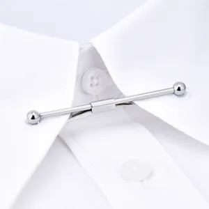 Silver metal collar pin detail, elegant shirt collar bar accessory for men styling.