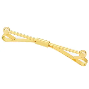 Gold metal collar bar detail close up, elegant men shirt accessory hardware component.