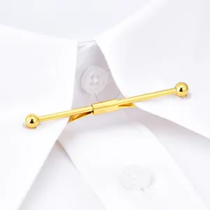 Gold tone metal shirt collar bar close up view, men business dress accessory detail shot