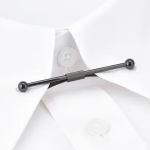 Close-up detail view of black metal collar bar pin for men, featuring smooth round ends.
