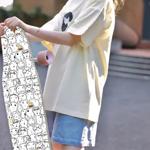 Longboard skateboard featuring cool doodle art design and smooth pink wheels for outdoor cruising.
