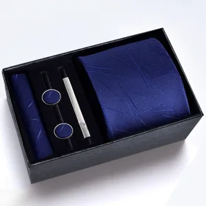 Coffret cadeau cravate homme bleu fonce avec pochette boutons de manchette pince a cravate.