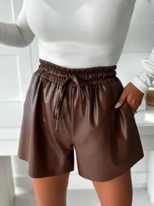 Detail shot of brown PU leather high-waisted wide-leg casual shorts with drawstring.