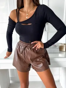 Stylish women's black top and brown PU leather shorts set, perfect for spring and summer chic style.