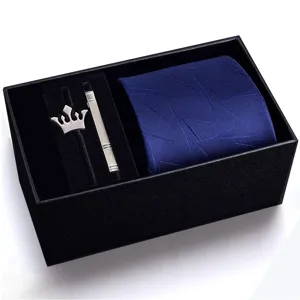 Men's blue silk texture tie gift set with silver crown brooch and tie clip in a black box.
