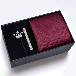 Mens tie gift box set featuring a burgundy tie, silver crown brooch, and tie clip.