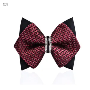 Detailed view of stylish men's bow tie featuring red black checkered pattern and rhinestone center.